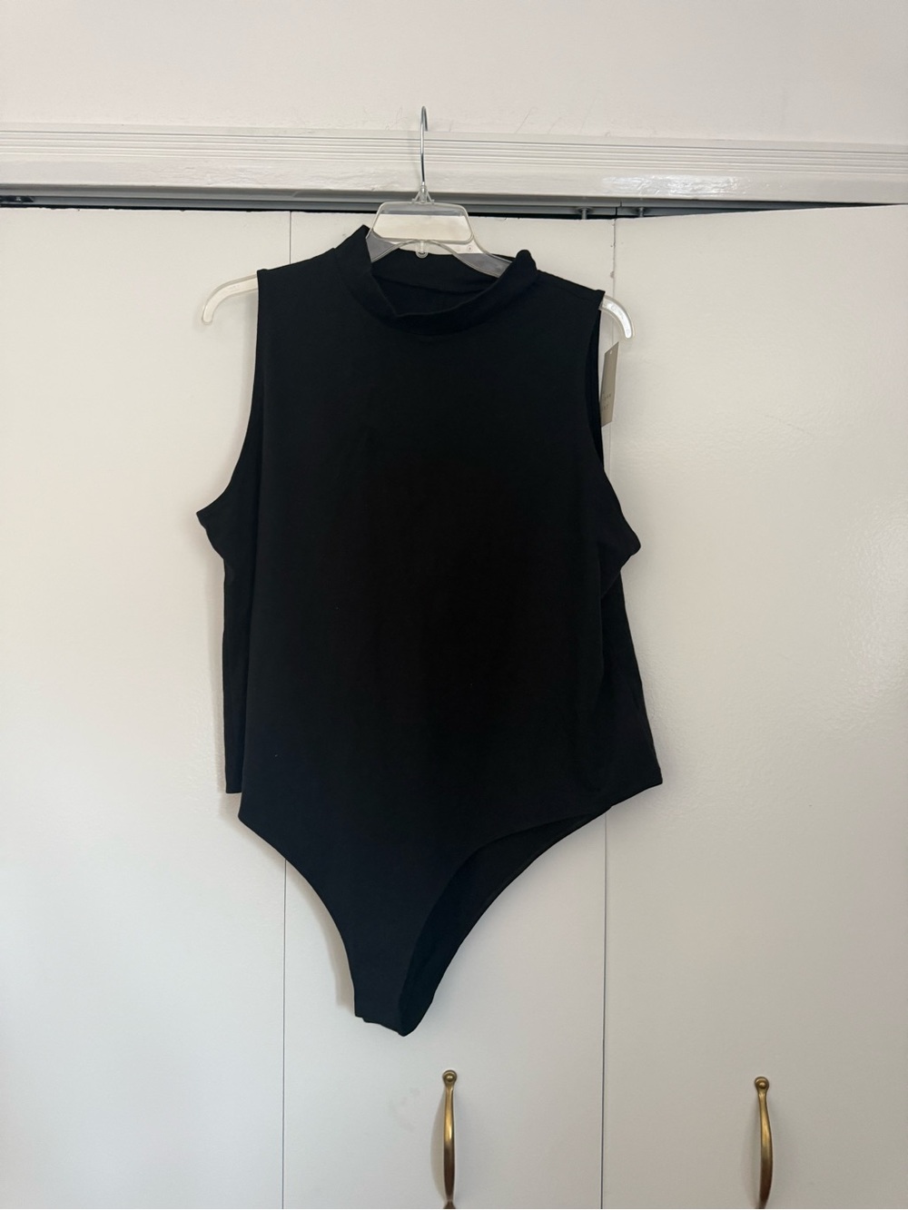 NWT Sleek Black Sleeveless Mock-Neck Bodysuit
